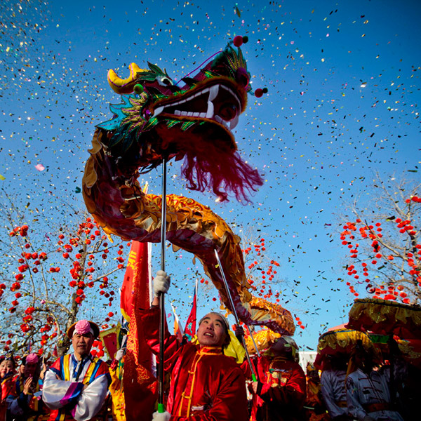 Actors perform the dragon dance